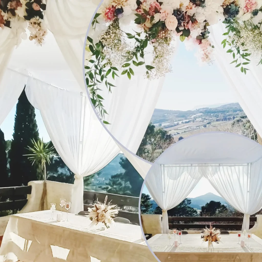 Magnifique houppa de mariage avec drapés blancs et composition florale romantique, offrant une vue panoramique sur la nature.